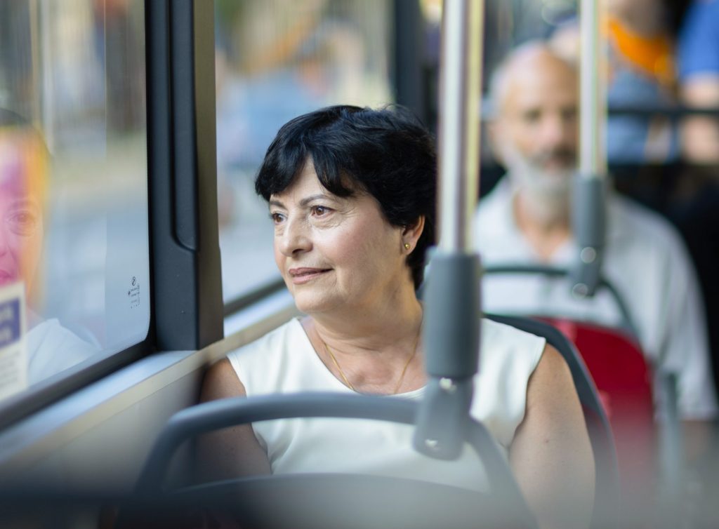 Woman riding bus