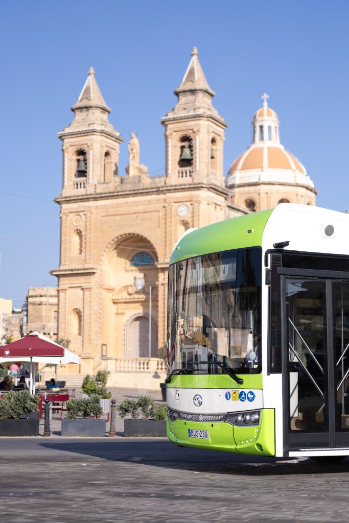 Bus driving through the village